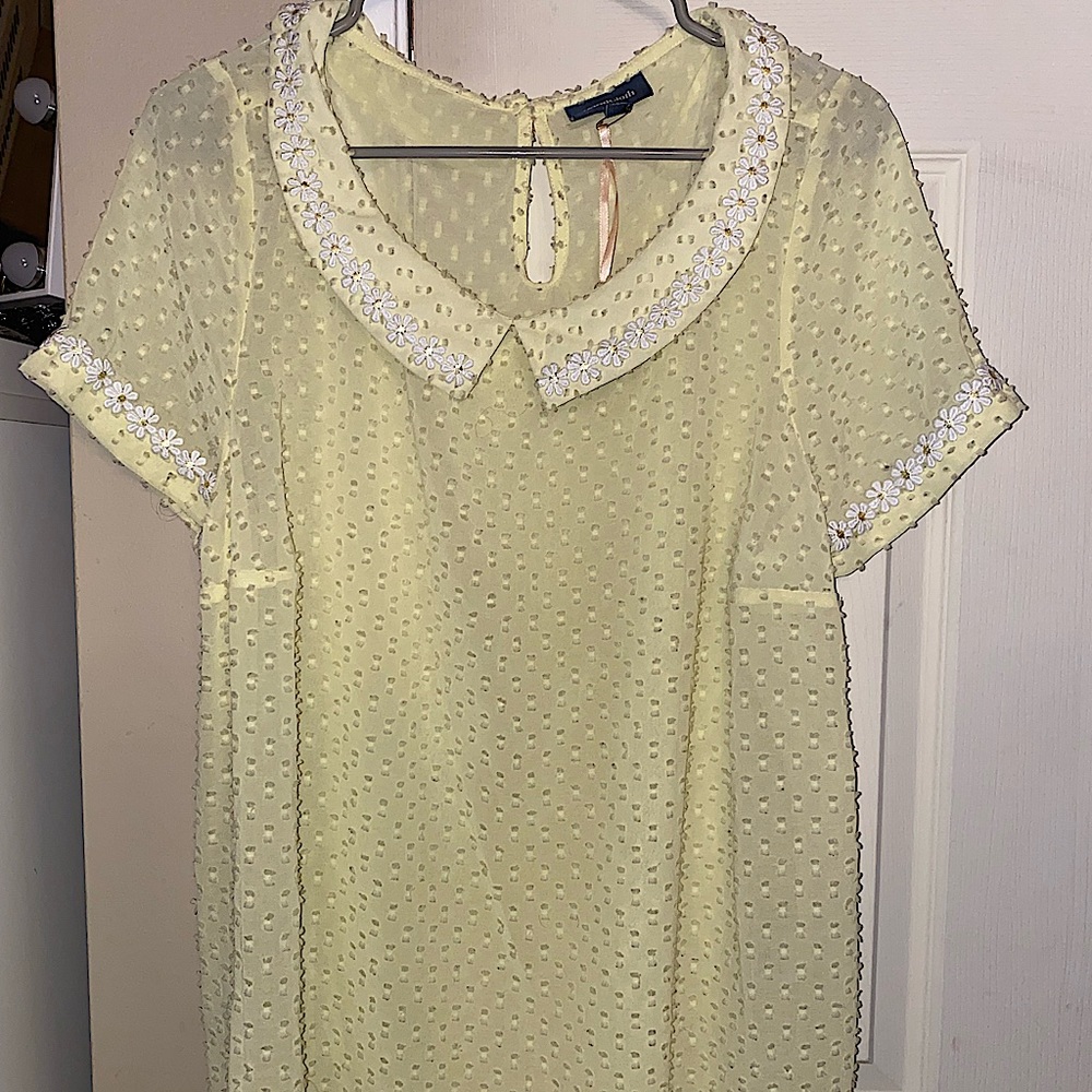 ModCloth yellow blouse with white flowers around the collar and sleeve